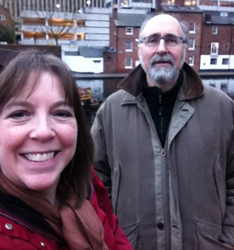 Behind The Trade Show Curtain Dena with Doug Kreinik, representing Kreinik Manufacturing Company at a trade show in Birmingham, England.