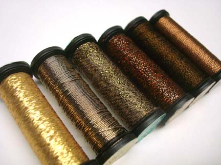 Spools of metallic threads