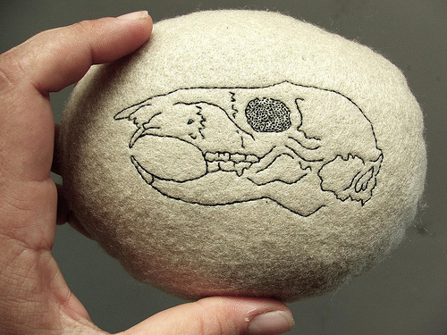 Nat Uhing | Hand Embroidery Skull embroidery on felt pebble by Smallest Forest