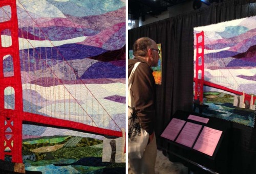 Stitches Unlimited: The Amazing Embroidery Of International Quilt Market Doug Kreinik admiring a wall quilt featuring Kreinik metallic threads, at International Quilt Market, Houston, Texas, October 2013.