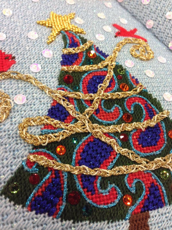 Where The Shops Shop A variety of threads, sequins, beads and stitches bring this painted needlepoint canvas to life.