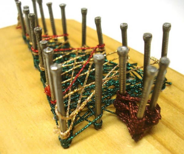 String Art - The Next Generation Is Shiny Christmas Tree string art created with Kreinik metallic threads (specifically, Medium #16 Braid).