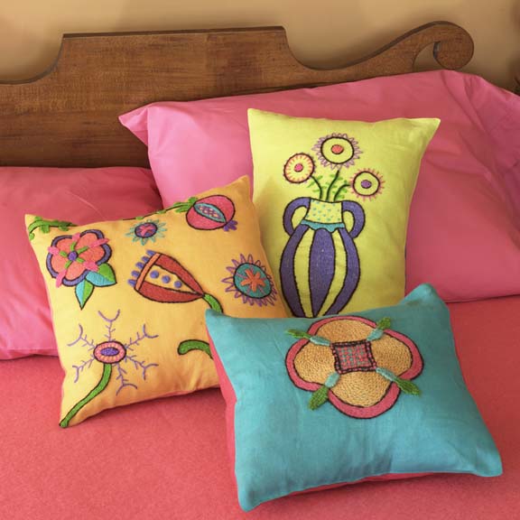 Kristen Nicholas - Crewel Pillows on Bed