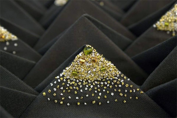 Julia Titchfield | Fashion Embroidery Detail of the embroidery embellishment on select points of the folds.
