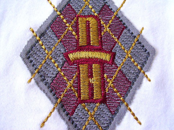 Density Is Our Destiny | Machine Embroidery Rough-cut applique showing the use of light density fills. Machine Embroidery Density settings can be used to achieve a host of effects.