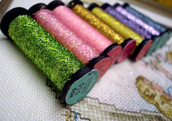 How Kreinik Makes Metallic Threads Metallic threads add light and color to needlework designs. Use them like a spice in cooking—to add interest, a little zip, to keep your design from being bland.